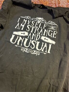 Strange and unusual tshirt